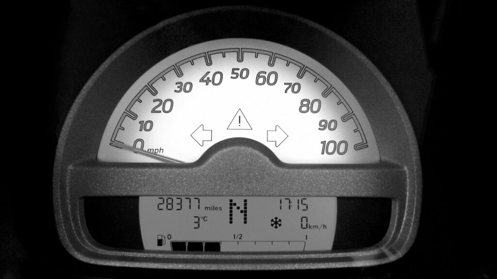 glowing warning light in the speedometer of the car.